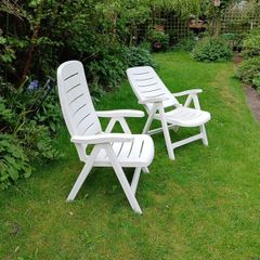 Recliner garden chairs.