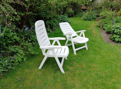 Recliner garden chairs.