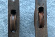 Two Antique Sash Window Pulleys