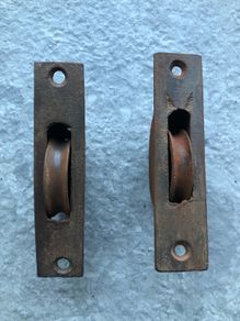 Two Antique Sash Window Pulleys