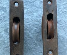 Two Antique Sash Window Pulleys