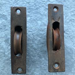 Two Antique Sash Window Pulleys