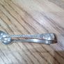 ornate silver sugar tongs Image 3