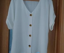 New Ladies Ivory top, brand new with tags.