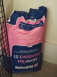 adhesive for tiles 15kg left opened two weeks ago