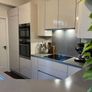 KUBE Modern High-Gloss Kitchen & AEG Appliances Image 5