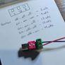 Input USB C voltage ranges from 4 V to 22 V. The output is 5V, 9V, 12V, 15V, 20V. Adjustable in increments using a combination of switches. Image 2