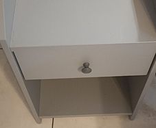 Grey bedside locker from Ikea