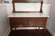 Antique mahogany wash stand with marble top