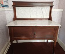 Antique mahogany wash stand with marble top