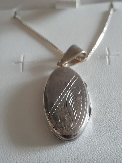 silver chain and locket