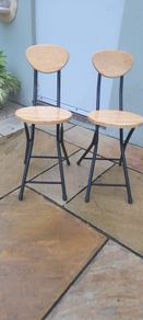 2 x folding wood and metal chairs