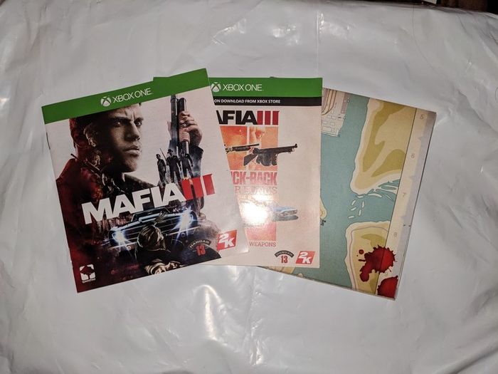 Gaming posters, manuals, DLC codes, art, post cards