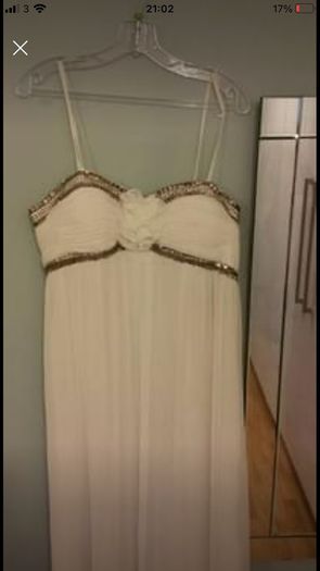 Brand new with tag designer handmade wedding dress by Dresscode. Grecian style with embellishments