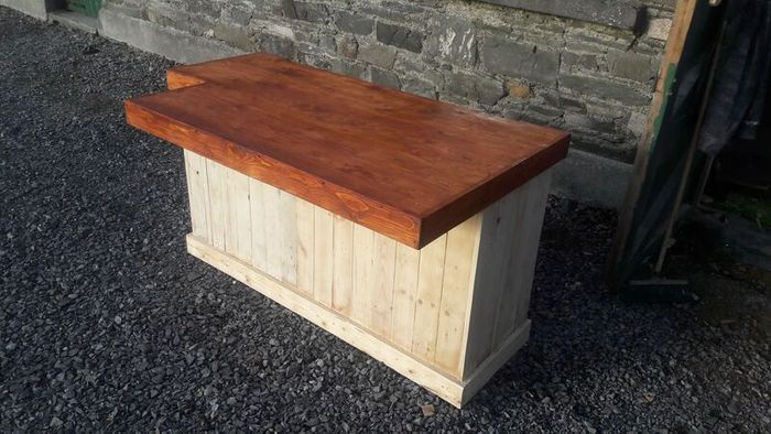 Rustic kitchen island with overhang
