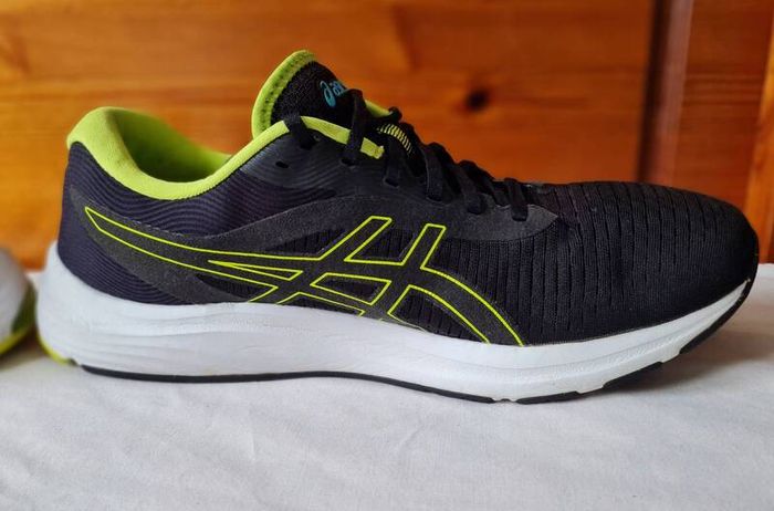 asics gel pulse 12 black/green Size 12 eu 48 in excellent condition