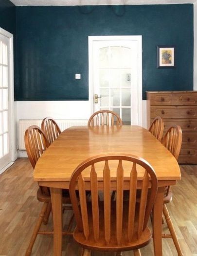 Wooden dining table and six chairs