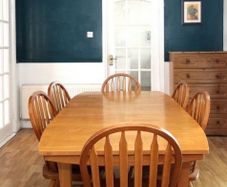 Wooden dining table and six chairs
