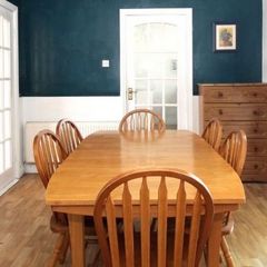 Wooden dining table and six chairs