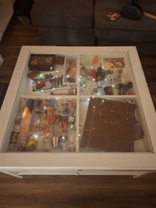 Discontinued ikea glass display coffee table.