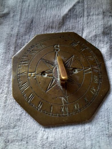 old miniature sundial