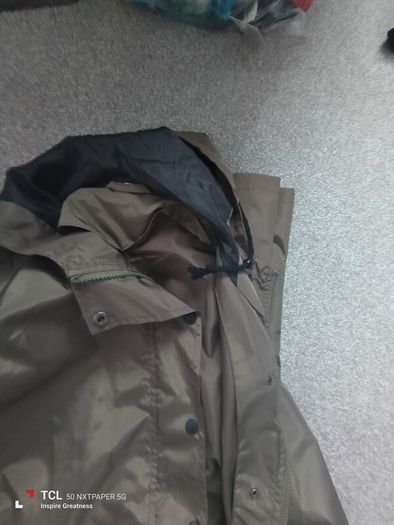 New.women's light rain jacket. Size 14/16