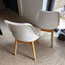 Two white bucket chairs Image 4