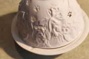 Nordic Lights porcelain tea light holder dome featuring a cat or dog theme.