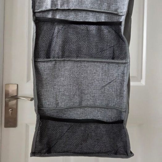 Grey fabric hanging closet organizer with 6 open shelves and side mesh pockets
