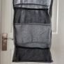 Grey fabric hanging closet organizer with 6 open shelves and side mesh pockets Image 7