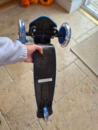 Blue light up 3 wheel scooter