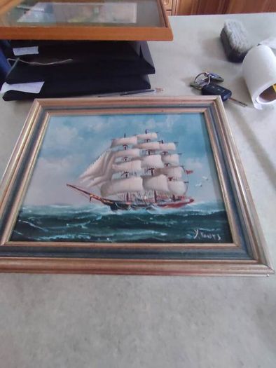 Framed oil of a sailing ship on board signed Y. Jones