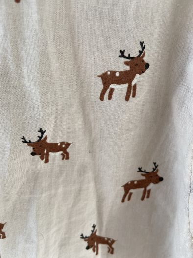 Long sleeve cream shirt with reindeer