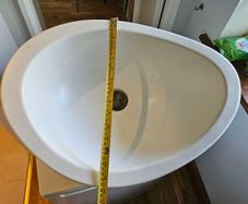 Solid surface wash basin