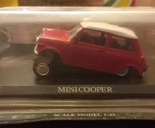 Vintage collectible cars in damaged boxes