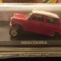 Vintage collectible cars in damaged boxes