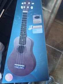 Ukulele new with box