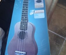 Ukulele new with box