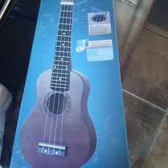 Ukulele new with box