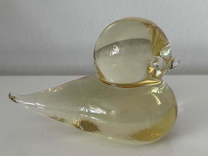 A beautiful yellow art glass bird by Reijmyre,Sweden