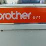 Brother Sewing Machine Model E, 671, With Pedal-Power Supply, Accessories, in reasonable condition, Box Cover & Base wood has major wear, but actually machine seems fine Image 3