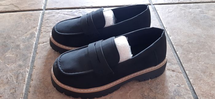 Black loafers