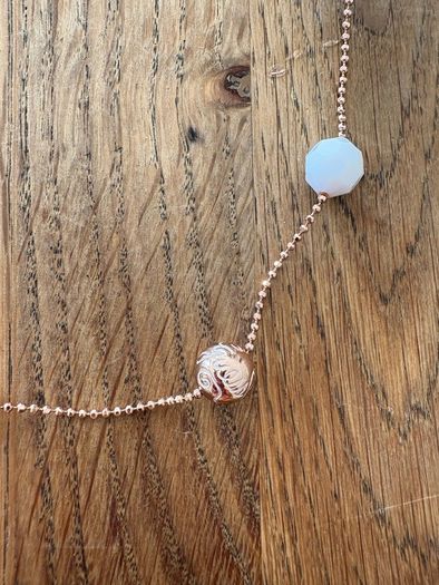 Guess 3 piece rose gold and white jewellery set.l