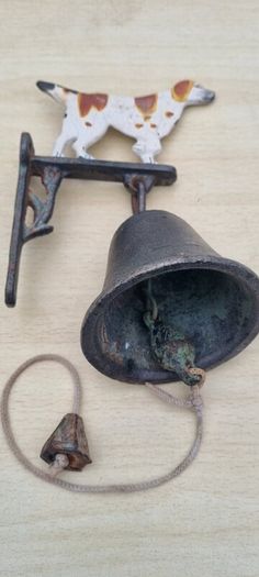 Vintage door bell with a dog figurine
