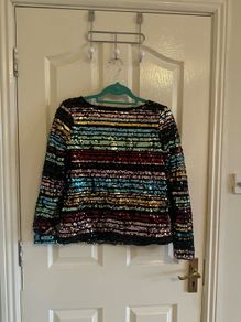 Rainbow oasis top size 10.