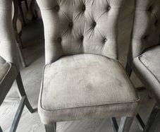 Three grey barstools