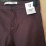 Primark  Burgundy Coated Trousers . S.12  B.N.W.T. Image 3