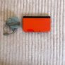 New Nintendo 3DS XL Orange and Black Image 3