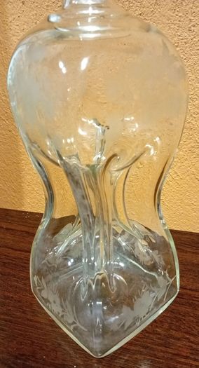 Antique hourglass shaped glass decanter