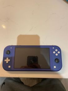 Nintendo switch lite with 8 games